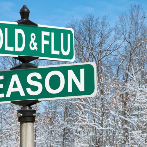 Cold and flu season signs on green